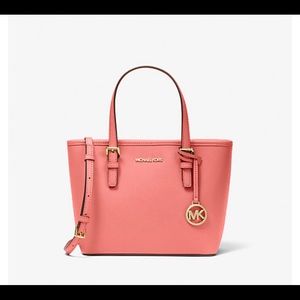 Nwt mk jet set Travel extra small saffiano bag.